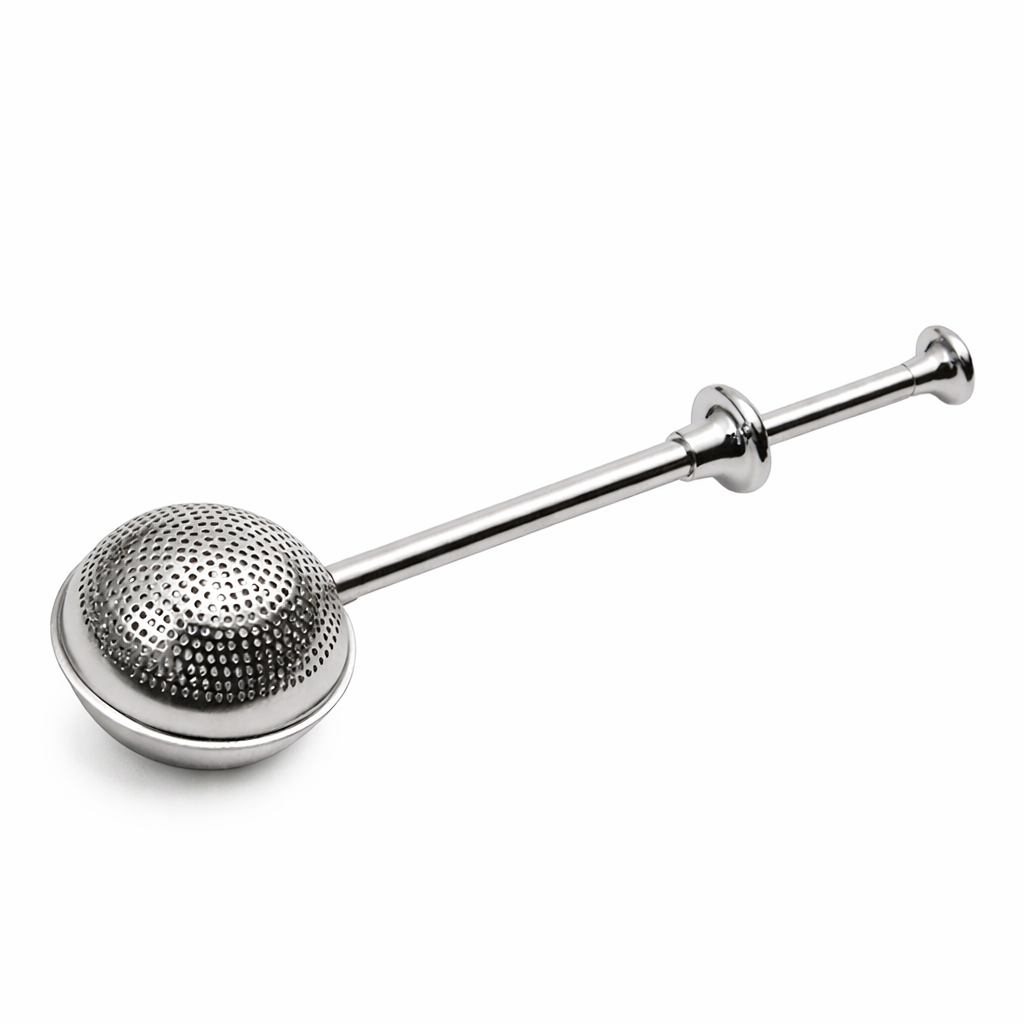 Metallic tea ball on a white background